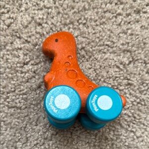Like New PlanToys Orange Dinosaur Wheel Toy